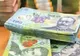 Doi bărbați au furat peste 1,3 milioane de lei din contul unui decedat cu ajutorul unei funcţionare bancare